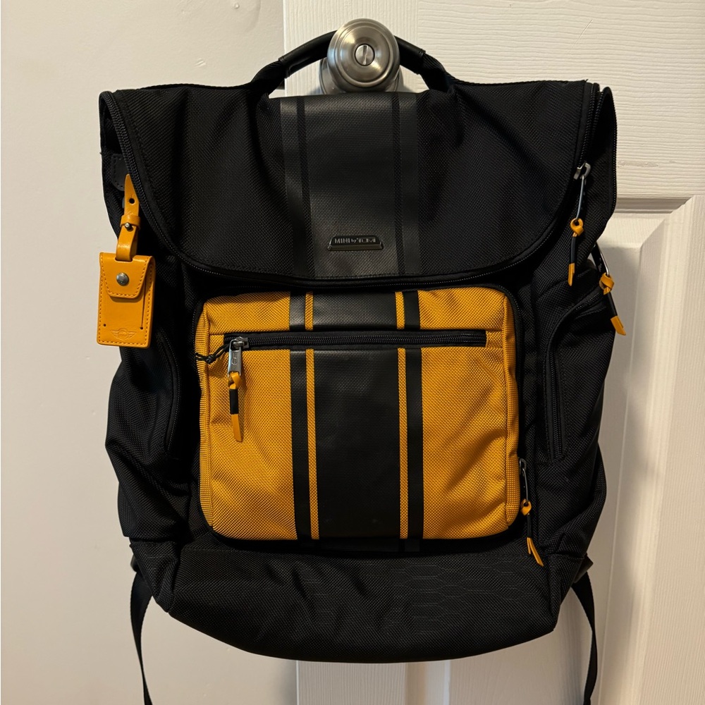 Like new mini x TUMI backpack with removable crossbody bag
